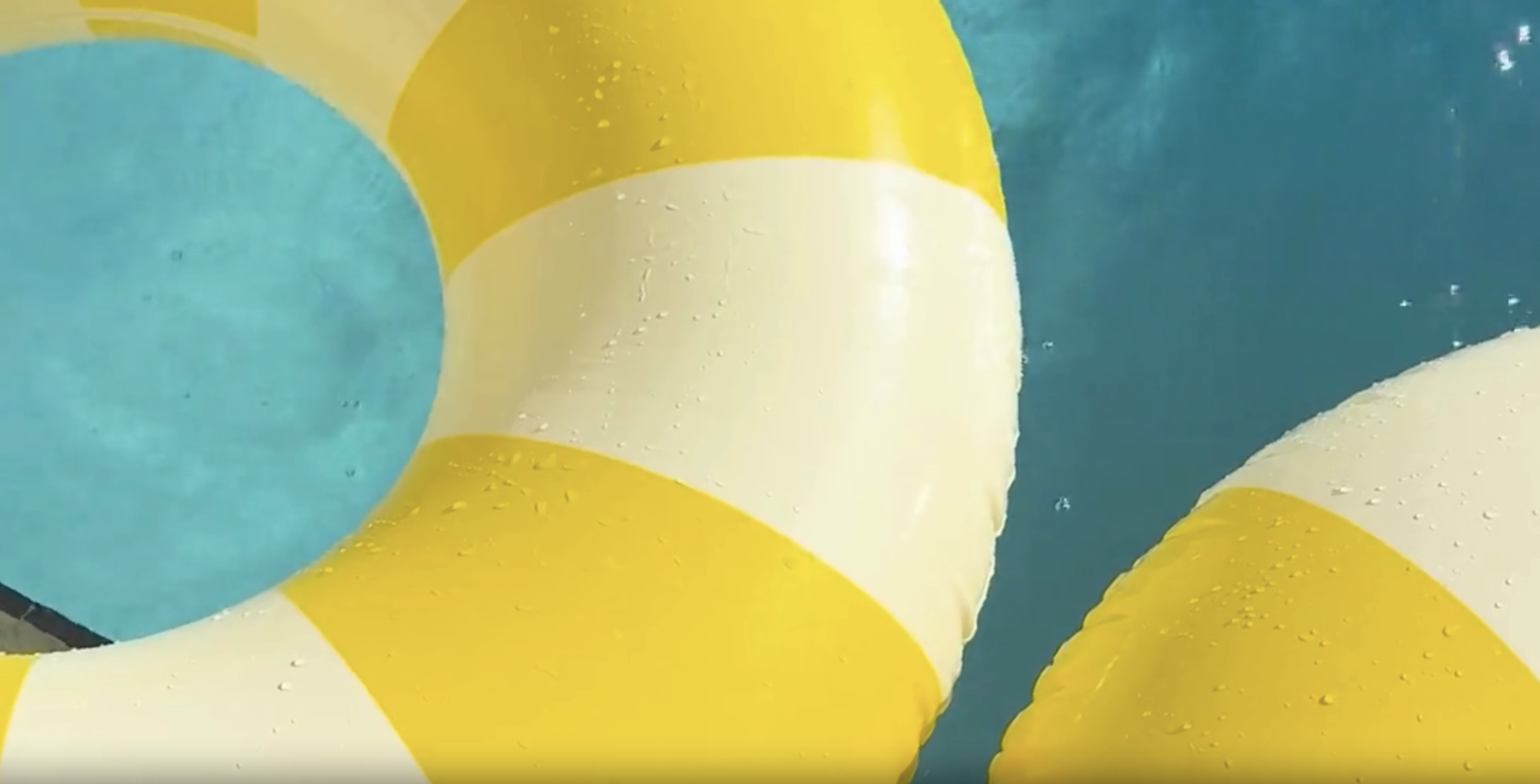 The Sunny Pool Floats - Yellow Pool Floaty in Pool